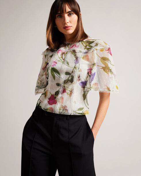 ARELLN-Tops-Our ARELLN top is a lovely addition to your new season wardrobe. Wide short sleeves and lace give it a vintage feel, while the scattered bouquet print is sure to get you noticed. Mesh top Lined Scattered bouquet print High neck Scalloped lace trims Wide short sleeves Button fastening with keyhole cut-out Julia is 5'10" / 1.78m and wears White in a Ted size 1- Ted Baker Romania